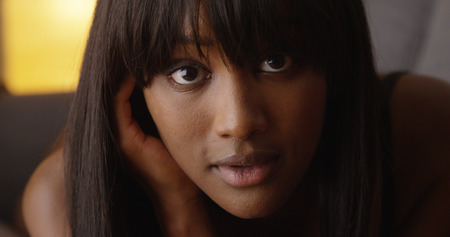 Sultry woman looking at cameraの写真素材