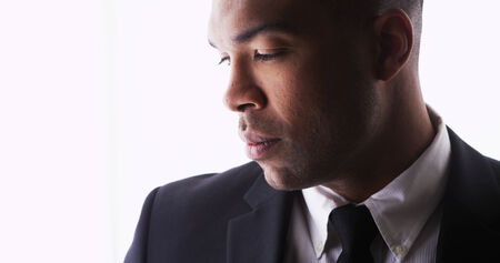Profile of handsome black man wearing a suitの写真素材