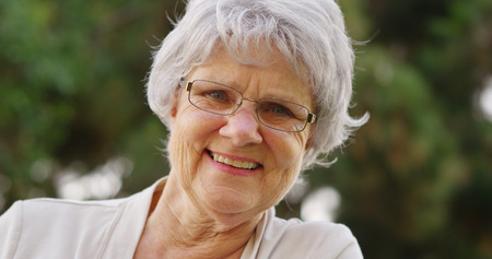 Mature woman smiling and looking at camera