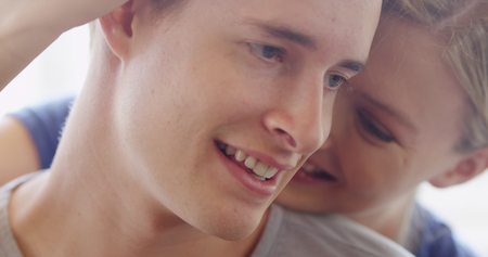 Closeup of young couple smiling in loveの写真素材