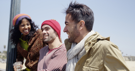 Attractive Group of multiracial friends laughing in the sunの写真素材