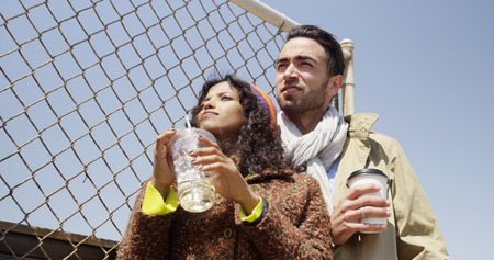 Young attractive couple enjoying the beach sunの写真素材