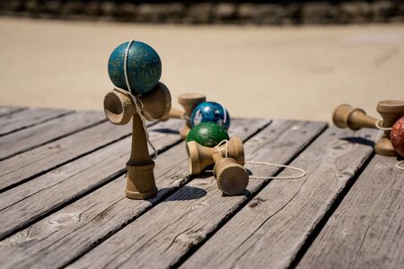 Japanese toy wooden Kendama on the wooden tableの写真素材
