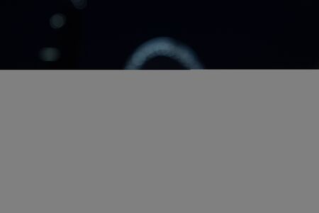 Abstract blurry dark outdoor plaza with a lot of bokeh