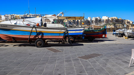Boats on a hard standing at Marsalforn harbour on the Mediterranean island of Gozo, in the Maltese archipelago.のeditorial素材