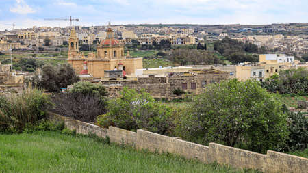 A view of Munxar church in the village of Muxar on the Mediterranean is land of Gozo in the Maltaese archipelago.の写真素材