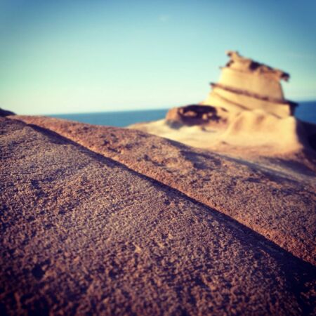 Weird rock formations by the bayの素材