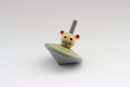 a gray cartoon spinning top white isolatedの写真素材