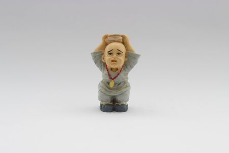 old chinese ceramic young monk doll isolatedの写真素材