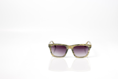natural color fashion sun glasses with purple lens isolatedの写真素材