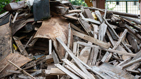 Close up pile of wood wastes and other trashの写真素材