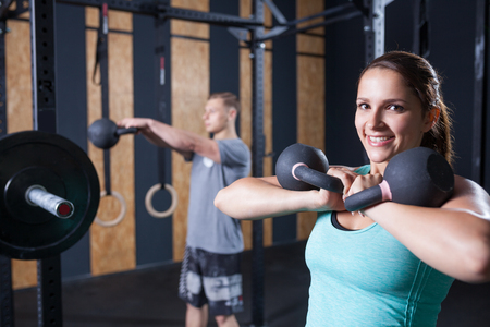 functional fitness workout at the gym with kettlebellの写真素材