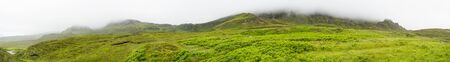 hills with fog panoramaの写真素材