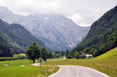 Scenic road with mountains in horizonの写真素材
