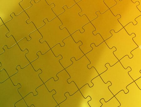 Golden puzzle pieceの写真素材