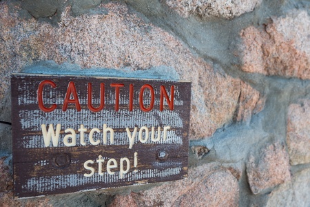 Painted watch your step signの写真素材