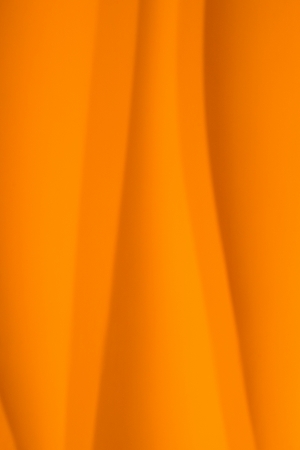Orange wavy background smooth verticalの写真素材