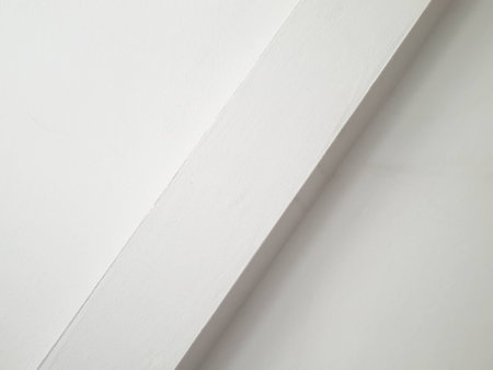 white cement wall with diagonal ledgeの写真素材