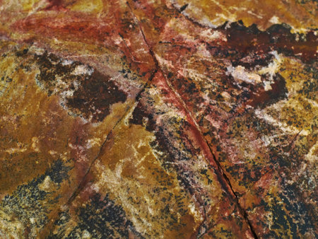 closeup shot of rough and grainy colourful stone texture