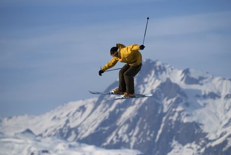 Male freestyle skier flying in the air.の写真素材