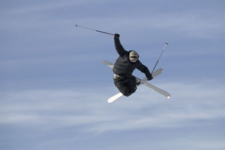 Male freestyle skier flying in the air.の写真素材