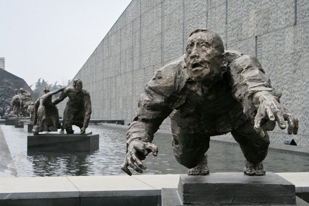 Nanjing, China -November, 27 2010 - A statue of victims at the Nanjing Massacre Memorialのeditorial素材