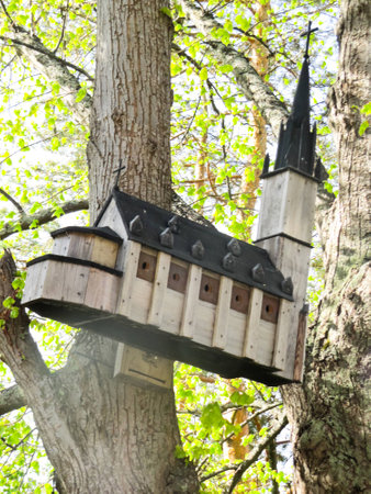 interesting birdhouse in the form of the layout of the building