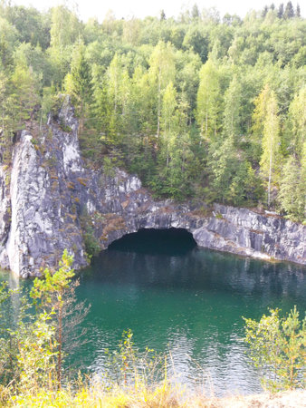 underwater cave on the river among the rocks