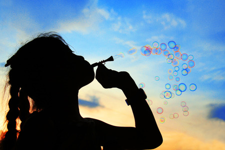 This photo was taken in Antipolo Rizal, Philippines. The title of this photo is "Blowing Bubbles".の写真素材
