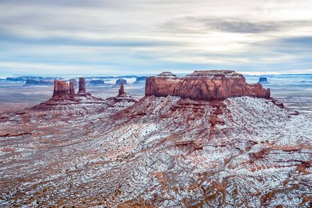 Aerial view Monument Valley covered in Snow during Sunsetの写真素材