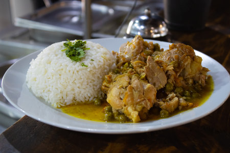 Rice with chicken and curry on the table in a restaurant.の写真素材