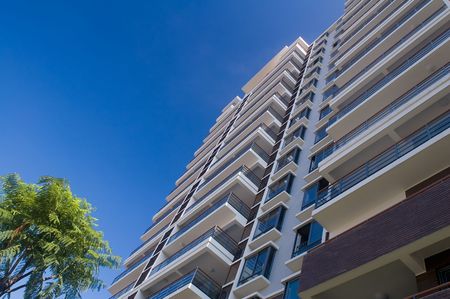 Tall office and residential building view from ground 