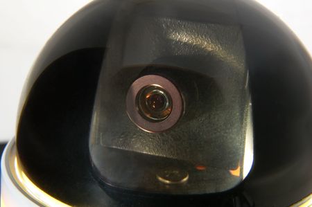 Monitoring camera with protective covering in the studio