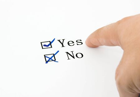 Check boxes and finger isolated on white backgroundの写真素材