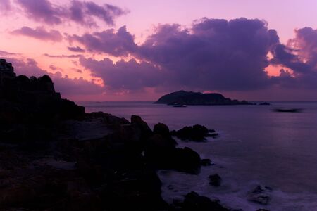 Coastal Sunrise on the rocky coastline in the southeast of Chinaの写真素材