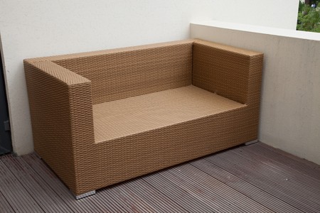Wicker sofa in yardの写真素材