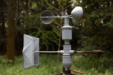 Outdoor anemometer, a meteorological instrument used to measure the wind speed, in the forestの写真素材