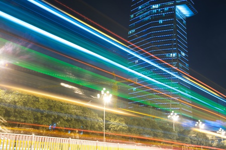 Night traffic through downtown in China. の写真素材