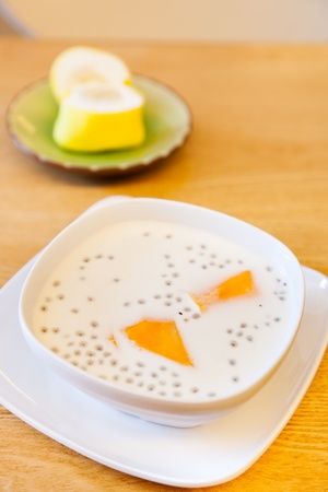 Breakfast  Milk and cake on tableの写真素材