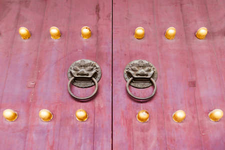 Chinese old style big bronze bell isolated on white. The bronze bell is one of the oldest musical...