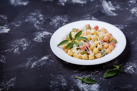 Classic italian lunch with Gnocchi with sage, butter and Parmesaの写真素材