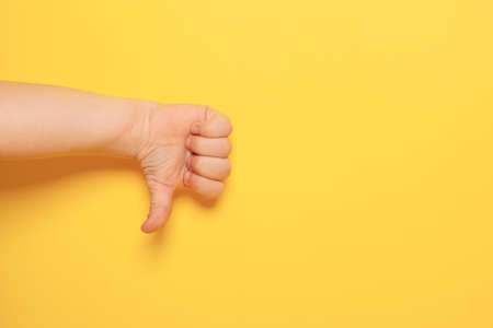 Hand gestures for expressing emotions on colored surfaceの写真素材