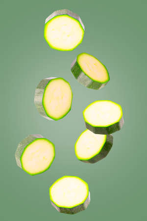 Creative flying fresh vegetable slices on trendy coloured backgroundの写真素材