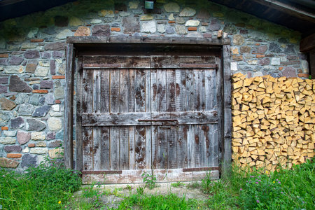 Beautiful stone hut in the high mountainsの写真素材