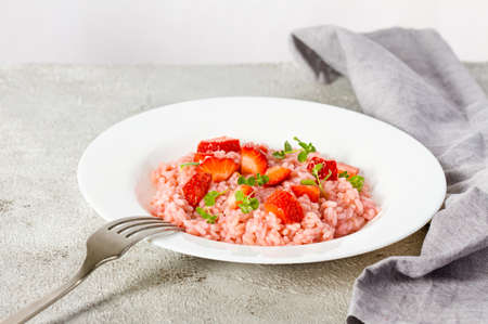 Fresh strawberry risotto a delicate and elegant dishの写真素材