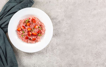 Fresh strawberry risotto a delicate and elegant dishの写真素材