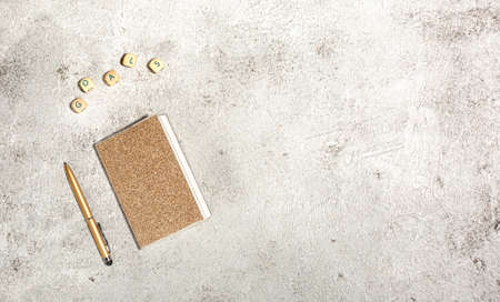 Mockup with notebooks and pen isolated on concrete background