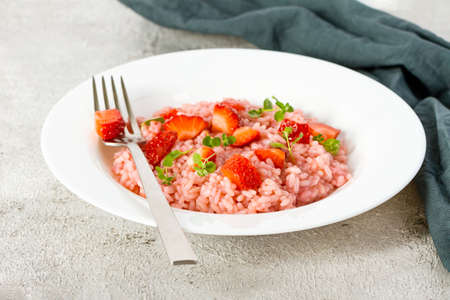 Fresh strawberry risotto a delicate and elegant dishの写真素材