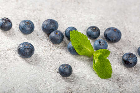 Fresh Blueberries on lihgt grey concrete tableの写真素材