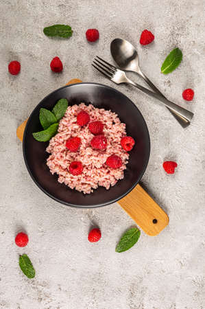 risottto with raspberries and yogurtの写真素材